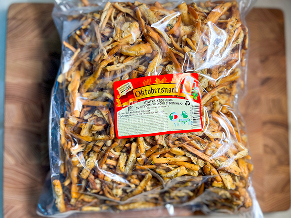 Нитка ЖАРЕНАЯ "Чеснок с зеленью" Oktobersnack 1 кг (сырный продукт) в Орле